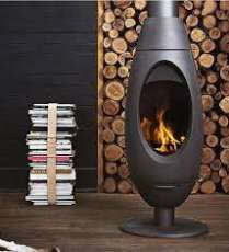 Печь-камин Invicta OVE стальная в интерьере Амазонка бай фото в Гомеле