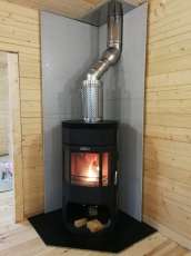 Недорогой камин с отделкой шамотом Сибирь 12 фото в интерьере в Гомеле