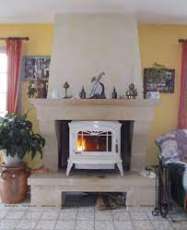 Печь-камин чугунный Invicta Bradford в интерьере Амазонка бай фото в Гомеле