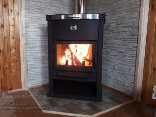 Стальной недорогой камин Теплодар ОВ-120 (угловой) фото в интерьере в Гомеле