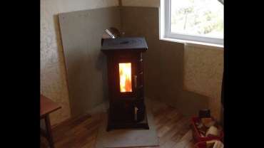 Отопительная печь Термофор Статика Тетра, чёрная бронза фото в интерьере в Гомеле