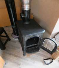 Недорогой печь-камин со стеклом Сибирь 6 фото в интерьере в Гомеле