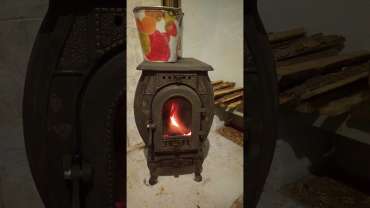 Печь отопительно-варочная чугунная "Сибирь" фото в интерьере в Гомеле