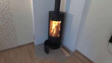 Стильная печь-камин с шамотом Мета-Бел Селигер в Гомеле фото в интерьере в Гомеле