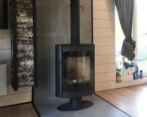 Печь-камин с теплообменником Мета-Бел АОТ 7.0-01 Свитязь фото в интерьере в Гомеле