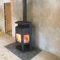 Купить недорогой камин с шамотом Мета-Бел Енисей в Гомеле фото в интерьере в Гомеле