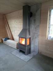 Недорогой камин Бавария со стеклами графит фото в интерьере в Гомеле