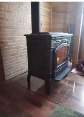 Печь-камин чугунный FireWay Gunter в интерьере чёрный Амазонка бай фото в Гомеле