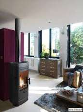 Печь-камин чугунный Invicta Gomont в интерьере Амазонка бай фото в Гомеле