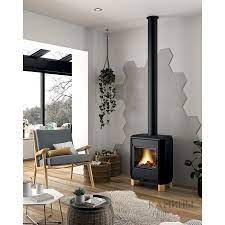 Печь-камин чугунный Invicta Carolo в интерьере Амазонка бай фото  в Гомеле