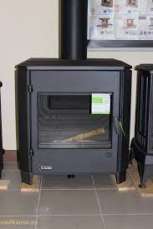 Печь-камин чугунный Invicta Carolo в интерьере Амазонка бай фото  в Гомеле