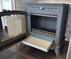 Печь-камин чугунный Invicta Altea в интерьере Амазонка бай фото в Гомеле