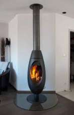 Печь-камин чугунный Invicta Ove в интерьере Амазонка бай фото в Гомеле