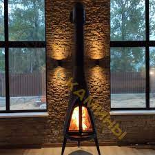 Печь-камин чугунный Invicta Pow-Wow в интерьере Амазонка бай фото в Гомеле